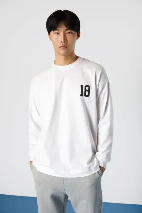 GRAPHIC LONG SLEEVE TOP