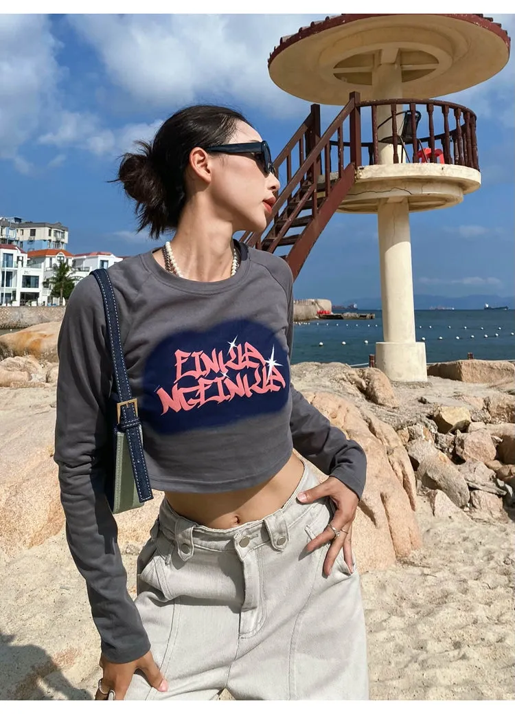 LINKA NELINKA Graphic Print Long Sleeve Solid Color Top