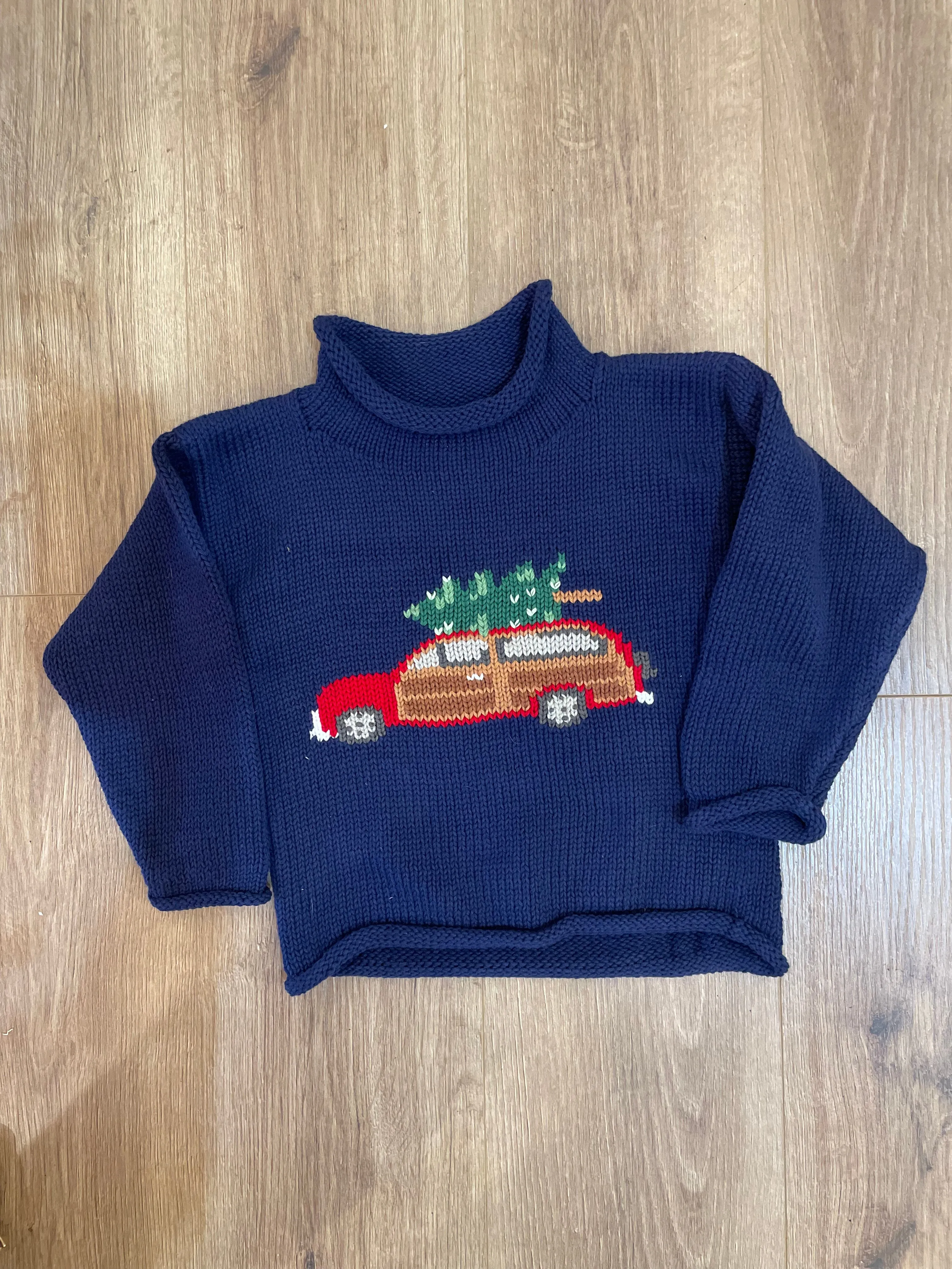 Woody Wagon Christmas Tree Roll Neck Sweater | Claver/Luigi