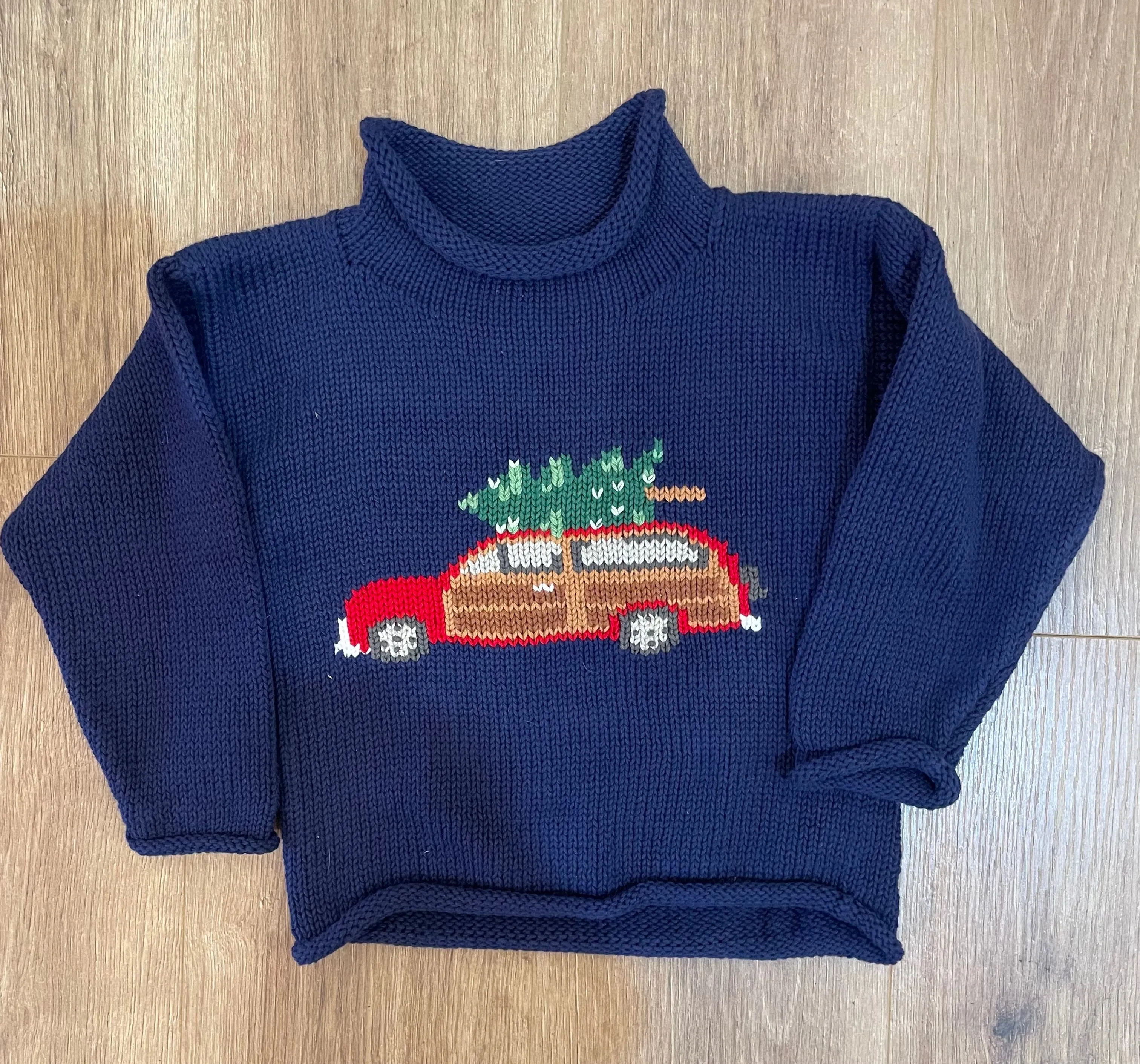 Woody Wagon Christmas Tree Roll Neck Sweater | Claver/Luigi